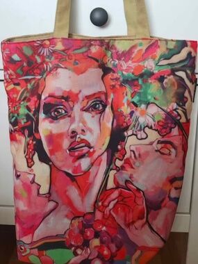 Women's canvas tote bag featuring colourful artwork